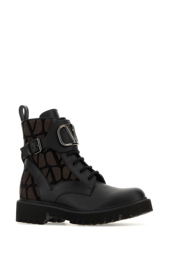 Two-tone leather and Toile Iconographe Logo Combat ankle boots