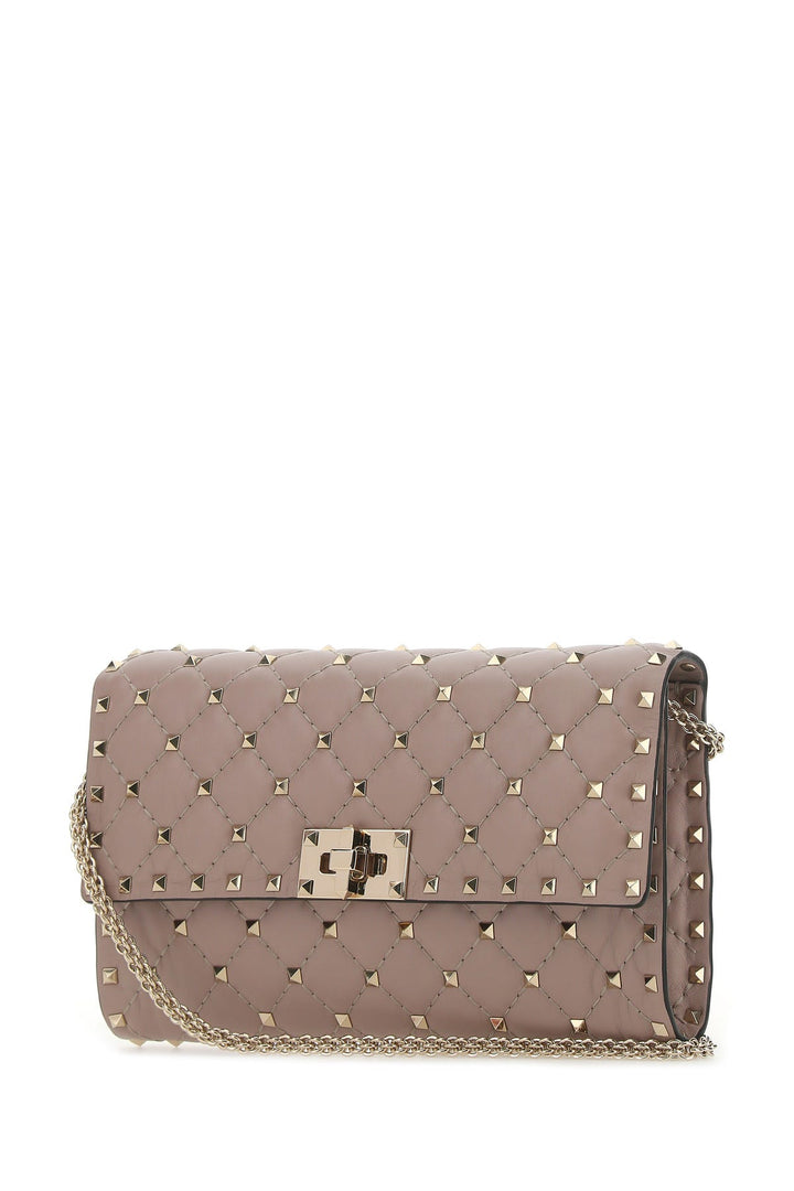 Antiqued pink nappa leather Rockstud Spike clutch