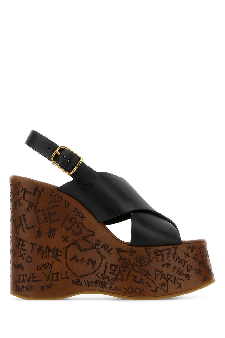 Black leather Maxime wedges