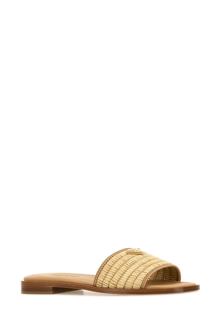 Beige raffia and leather slippers